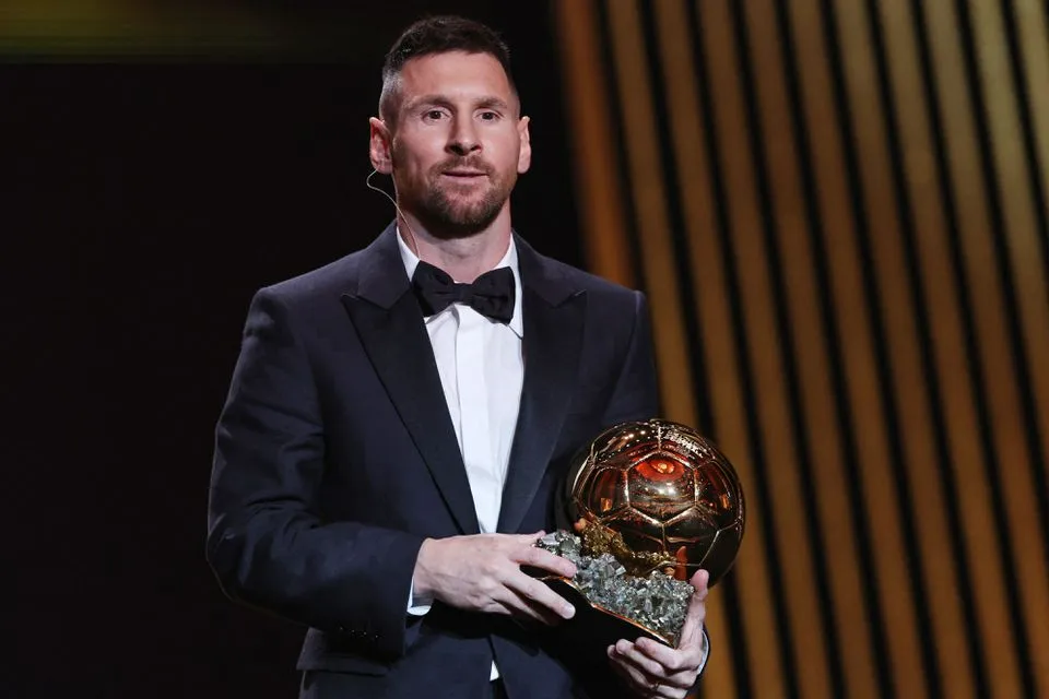 Messi wins record eighth Ballon